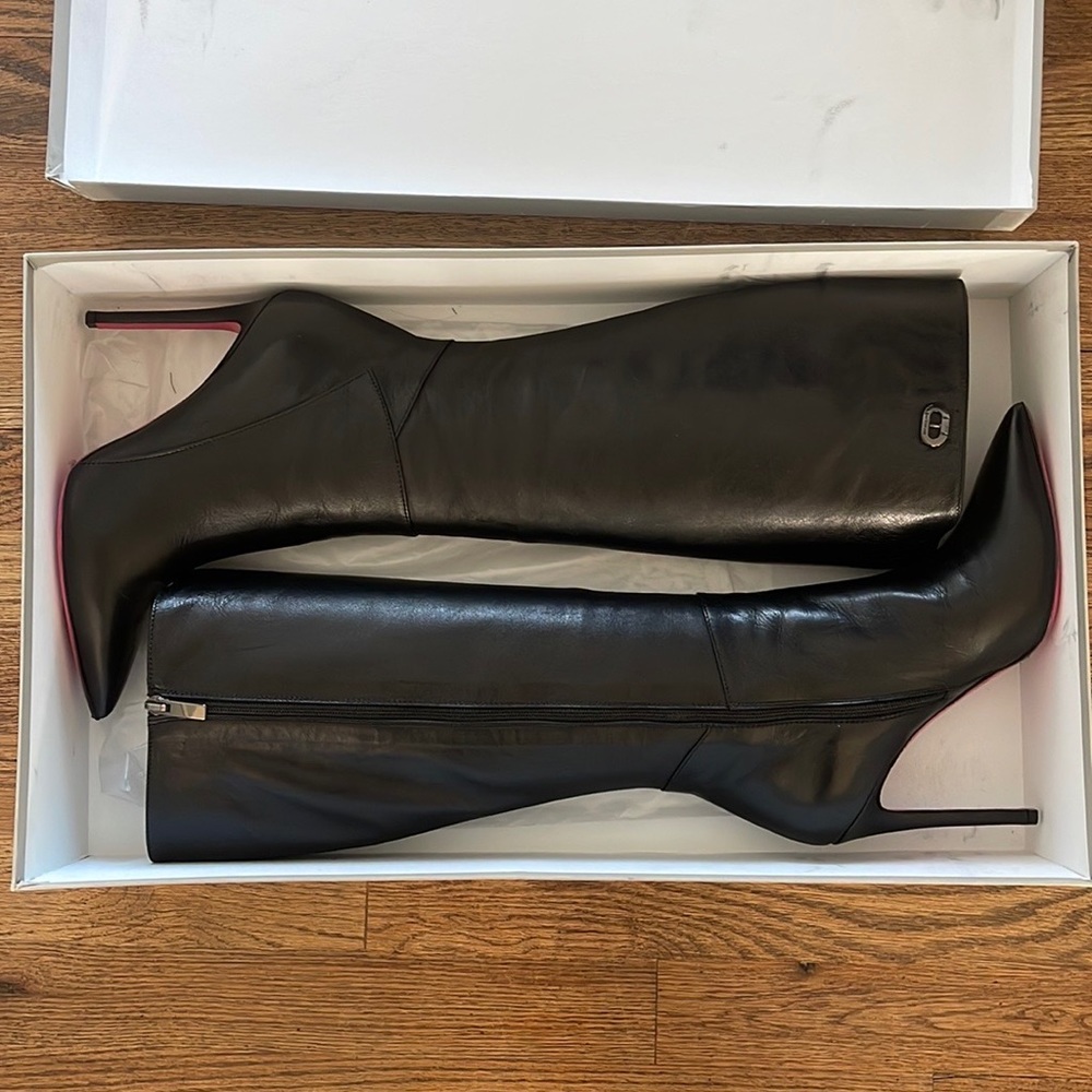 Dee Ocleppo black leather knee high boots.
